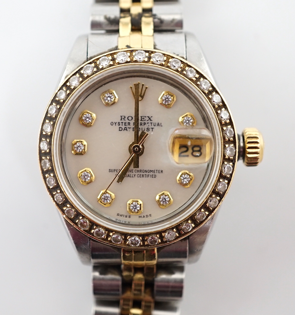 A lady's 1980's stainless steel and gold Rolex Oyster Perpetual Datejust wrist watch, with mother of pearl dial and diamond dot markers and bezel
